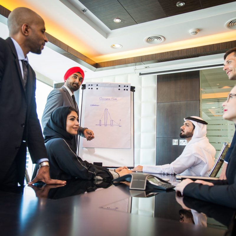 Multicultural business people meeting and talking about business - Multiracial business team meeting